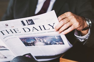 Businessman reading the daily news