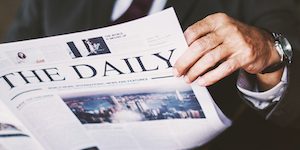 Businessman reading the daily news